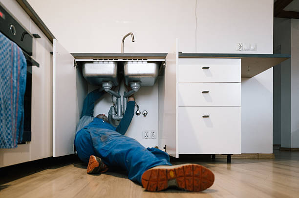 Professional Drain Cleaning technician working in Mineral Springs, AR